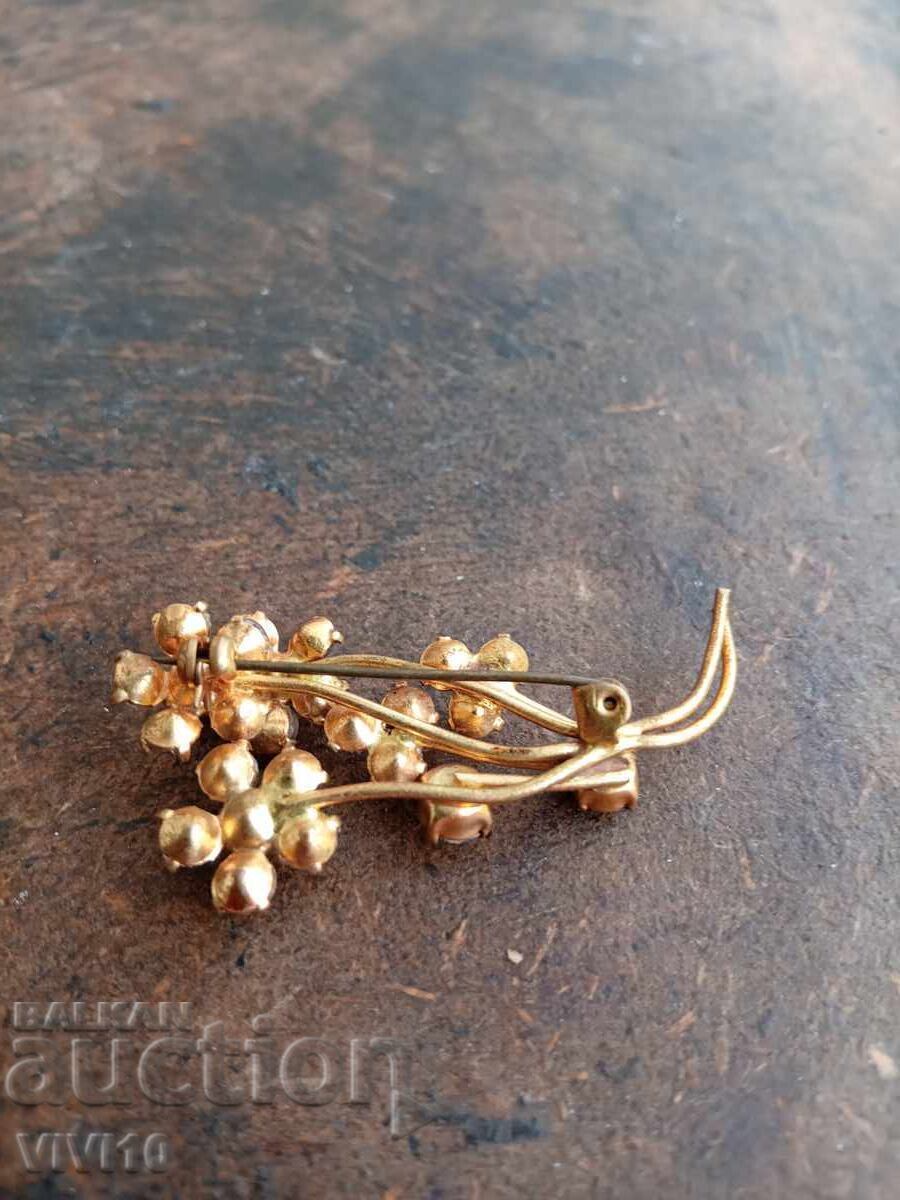 Auction  Antique brooch with stones