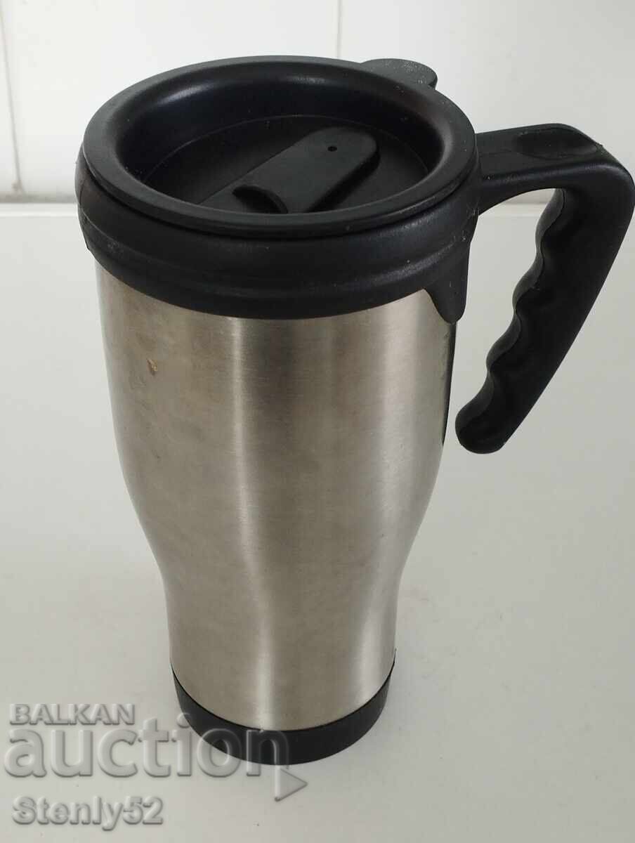 Thermal cup with lid for tea, coffee while driving and walking Thermal cup with lid for tea, coffee while driving and walking