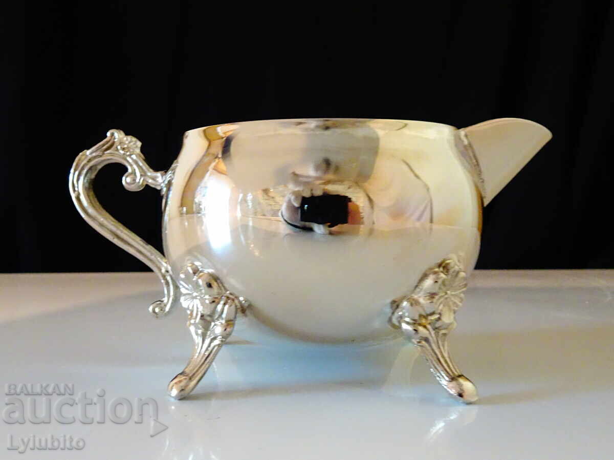 Auction Silver-plated brass pitcher, sauce boat Auction Silver-plated brass pitcher, sauce boat