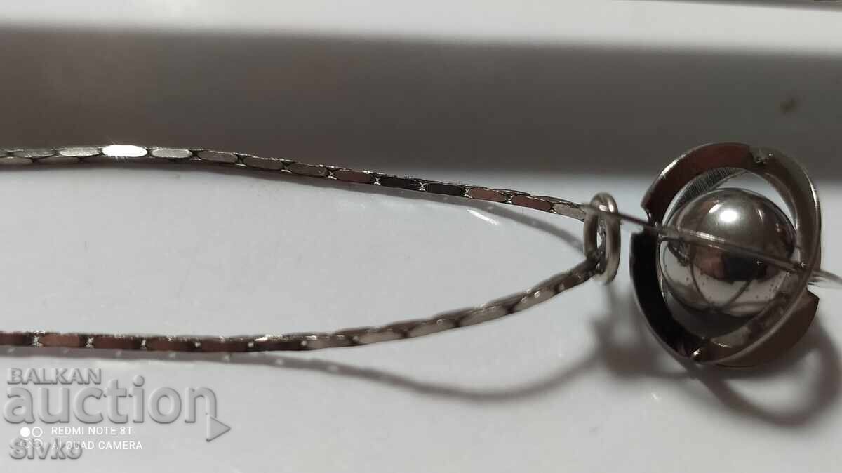 Necklace with a moving sphere Necklace with a moving sphere