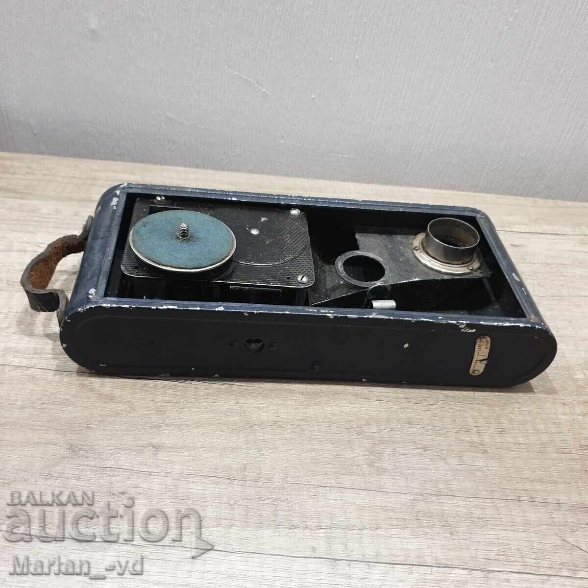 Παράδοση Φορητό ελβετικό πικάπ Colibri σε σχήμα φωτογραφικής μηχανής