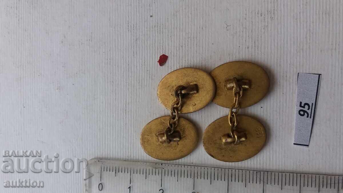 Delivery of BRONZE CUFFLINKS, ENAMEL