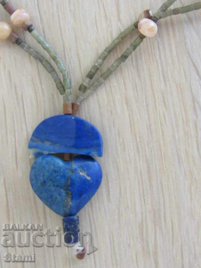 African-motif necklace in grunge style - 7 with price 17.00 BGN | € 8.69 African-motif necklace in grunge style - 7 with price 17.00 BGN | € 8.69