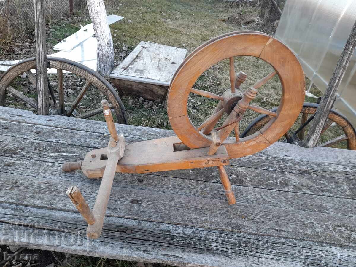 Auction  Antique spinning wheel