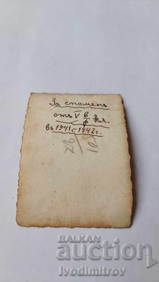 Photograph Sofia Student carrying wrapped package 1941 with price 2.45 BGN | € 1.25 Photograph Sofia Student carrying wrapped package 1941 with price 2.45 BGN | € 1.25