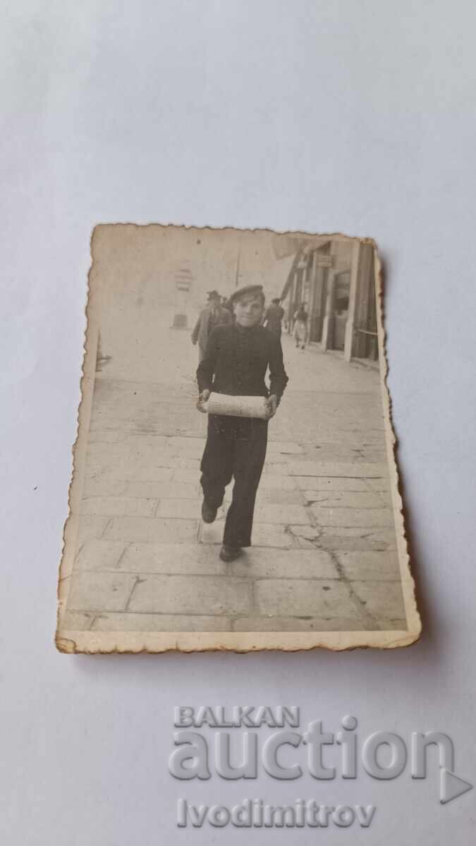 Photograph Sofia Student carrying wrapped package 1941 Photograph Sofia Student carrying wrapped package 1941