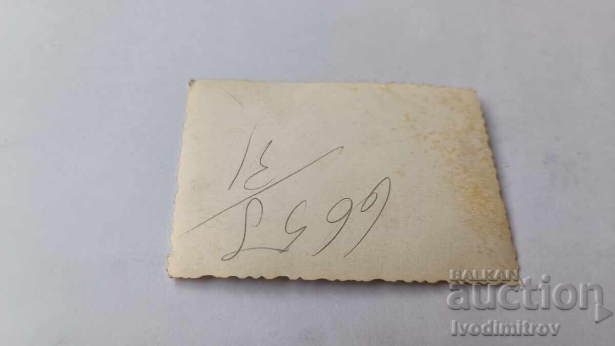 Photo Sofia Two men woman and two boys in front of TSUM with price 1.85 BGN | € 0.95 Photo Sofia Two men woman and two boys in front of TSUM with price 1.85 BGN | € 0.95