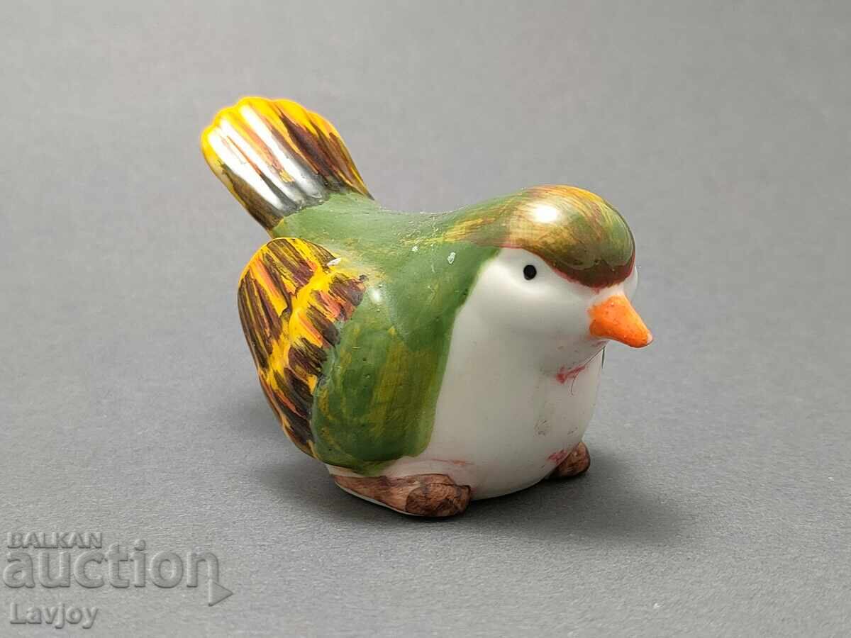 Auction Porcelain bird figurine Auction Porcelain bird figurine