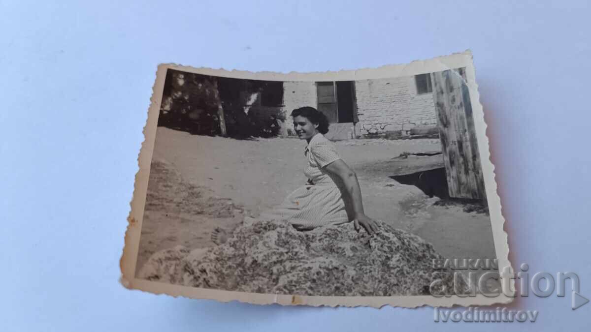 Photo Young girl in the yard 1956 Photo Young girl in the yard 1956