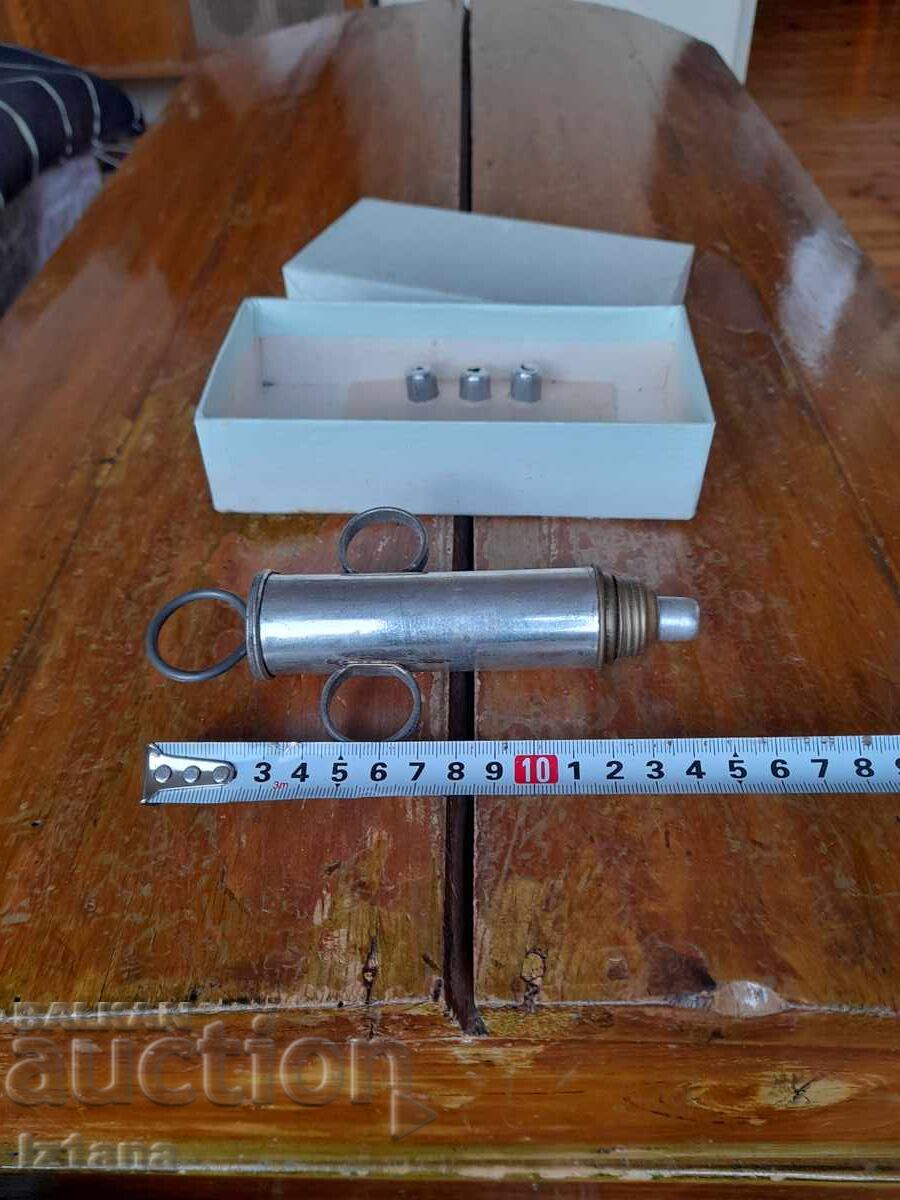 Παράδοση Μια παλιά σύριγγα ζαχαροπλαστικής