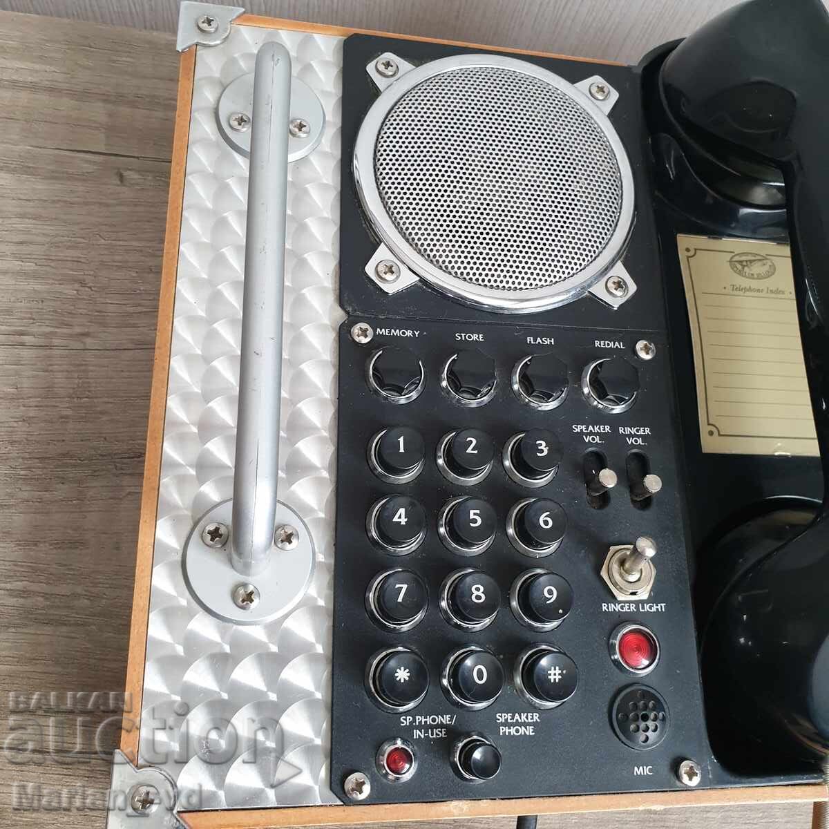 Auction Retro phone with a loudspeaker Auction Retro phone with a loudspeaker