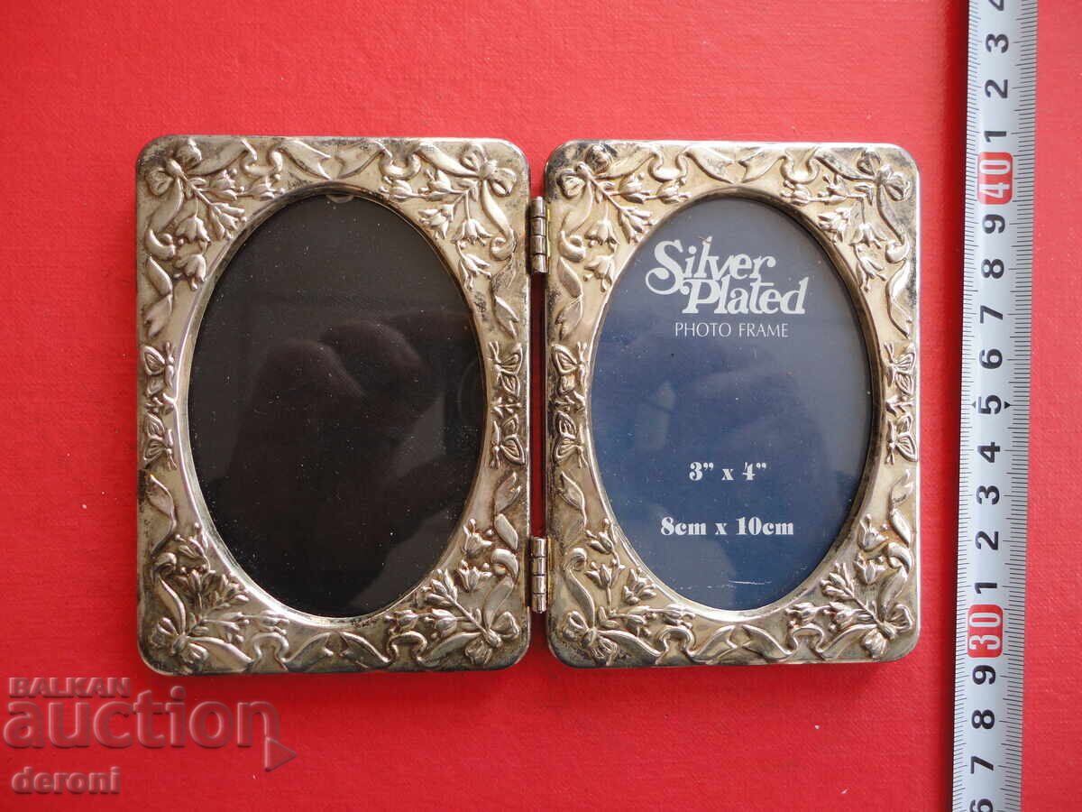 Rama foto dublă argintată incredibilă cu preț 25.00 BGN | € 12.78