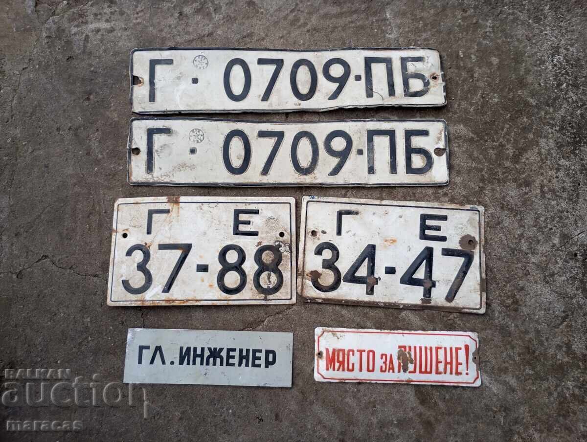 Old car license plates and signs