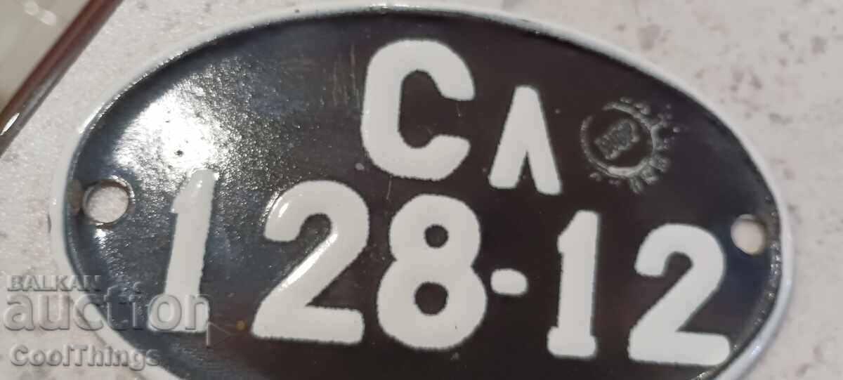 Auction Old enameled sign for a vintage motorcycle Auction Old enameled sign for a vintage motorcycle