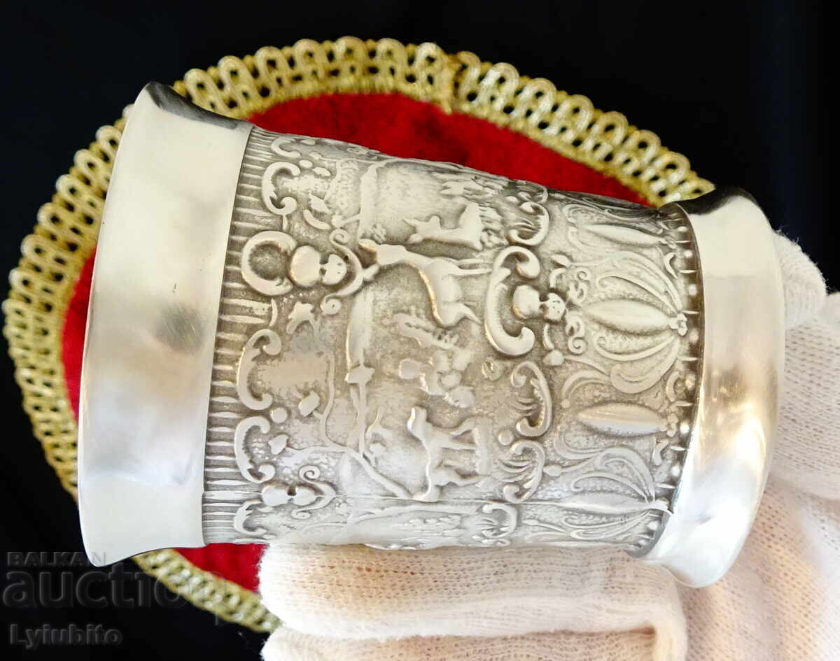 Δημοπρασία Τσιγκένιο κύπελλο με κυνηγετικά έργα ζωγραφικής, αγγέλους, μπαρόκ. Δημοπρασία Τσιγκένιο κύπελλο με κυνηγετικά έργα ζωγραφικής, αγγέλους, μπαρόκ.