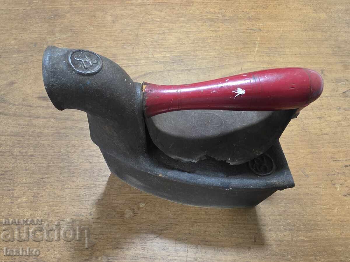 Auction An old iron on fire Auction An old iron on fire