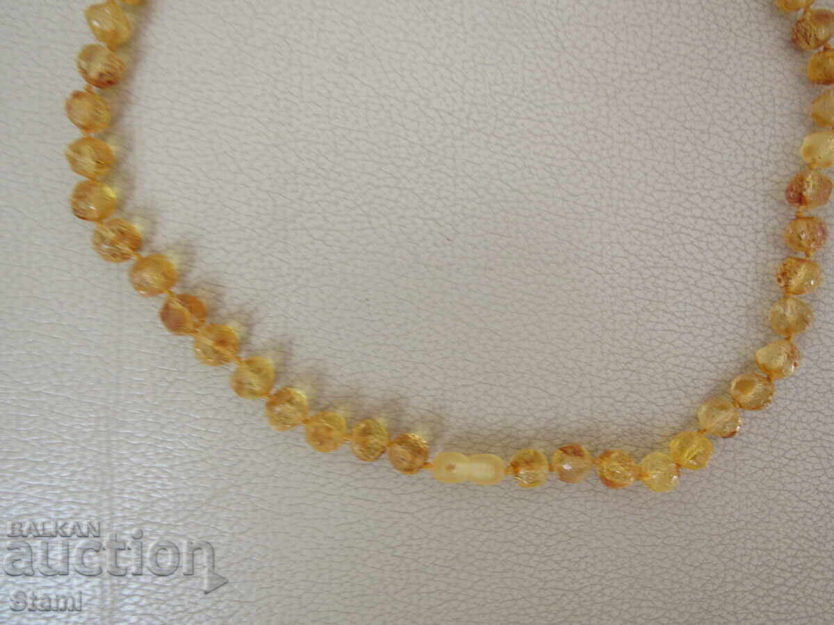 Women's circle necklace made of premium Baltic amber with price 180.00 BGN | € 92.03 Women's circle necklace made of premium Baltic amber with price 180.00 BGN | € 92.03