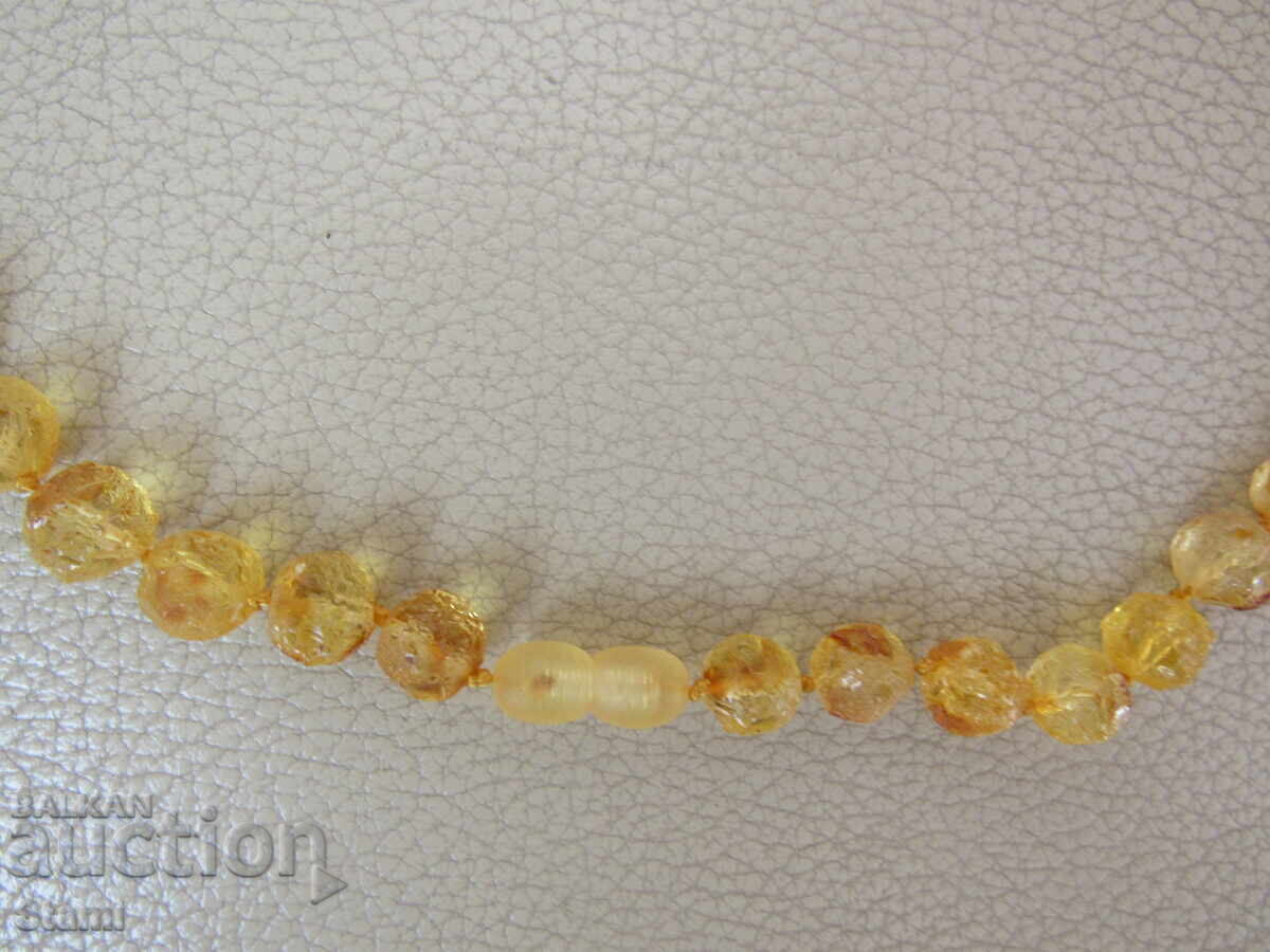 Auction Women's circle necklace made of premium Baltic amber Auction Women's circle necklace made of premium Baltic amber