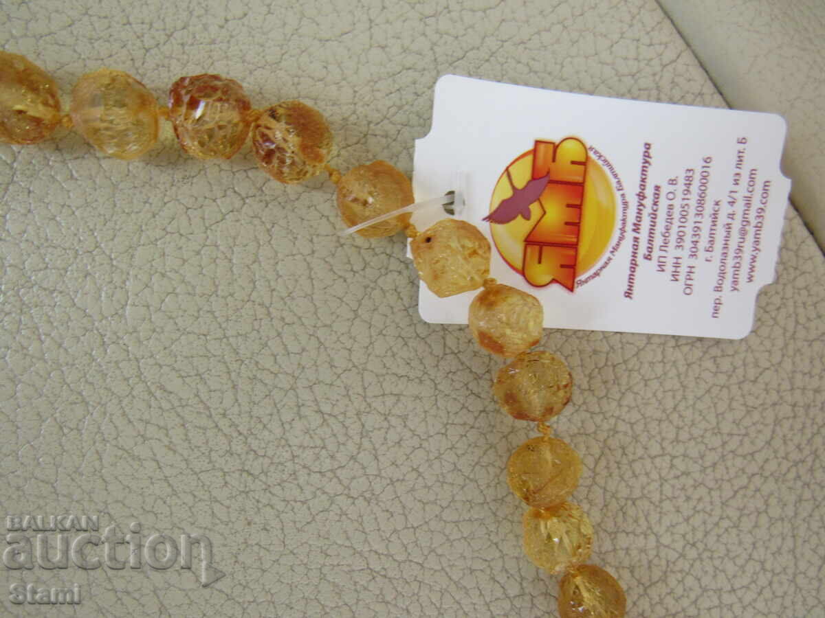 Delivery of Women's circle necklace made of premium Baltic amber Delivery of Women's circle necklace made of premium Baltic amber
