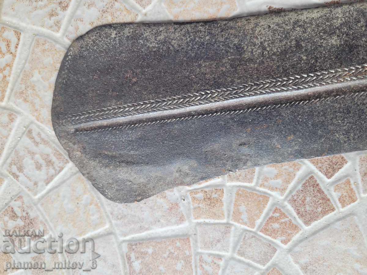 Παράδοση Σπαθί, σπάθα, κονγκολέζικη κούμπα