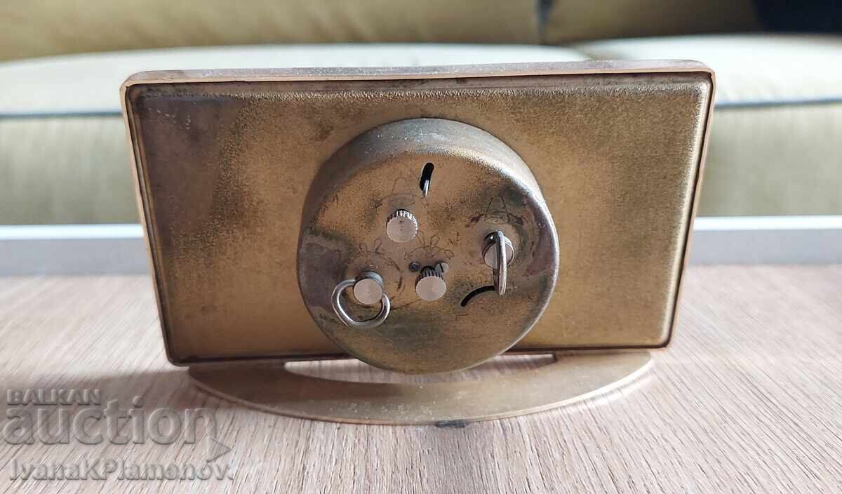 Auction  Mechanical table clock for collectors