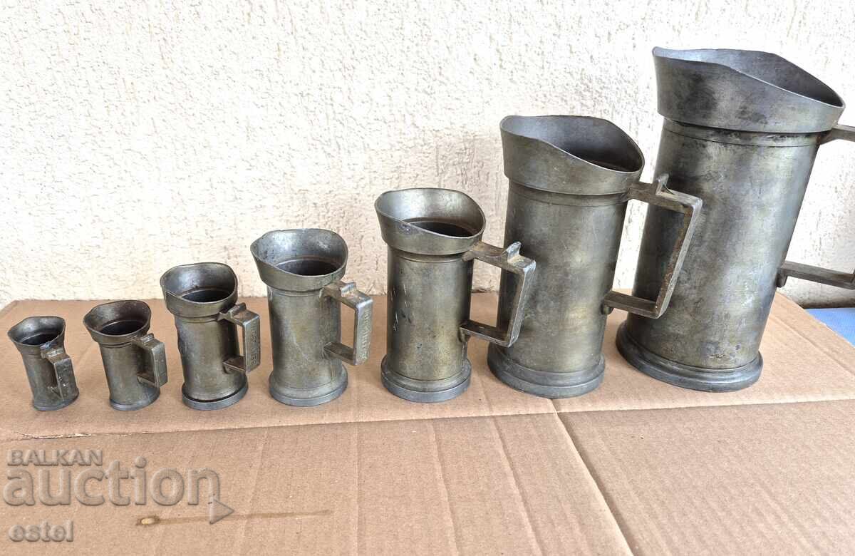 Σετ παλαιών μέτρων υγρών Σετ παλαιών μέτρων υγρών