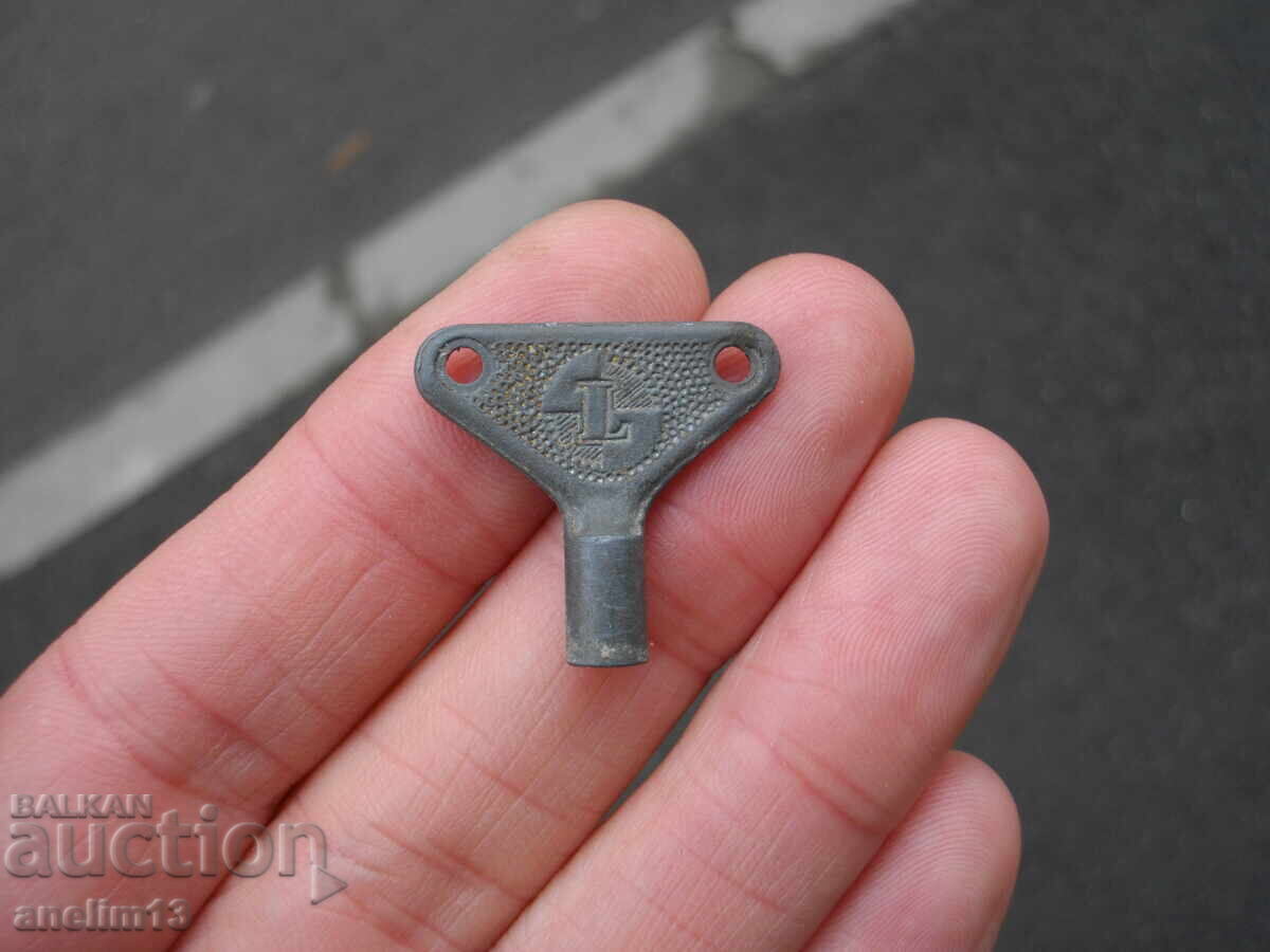 OLD KEY KEY FOR MECHANICAL TOY OR CLOCK