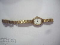 Gold-plated women's watch.
