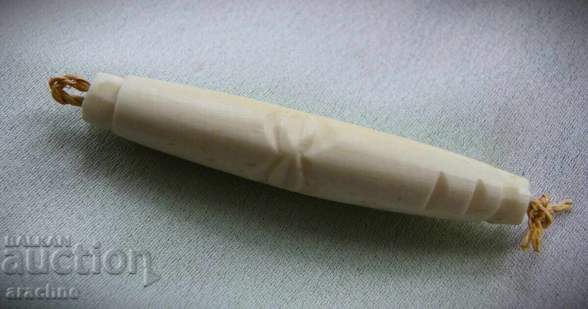 Delivery of Large pendant, carved from a hippopotamus tooth, Namibia Delivery of Large pendant, carved from a hippopotamus tooth, Namibia