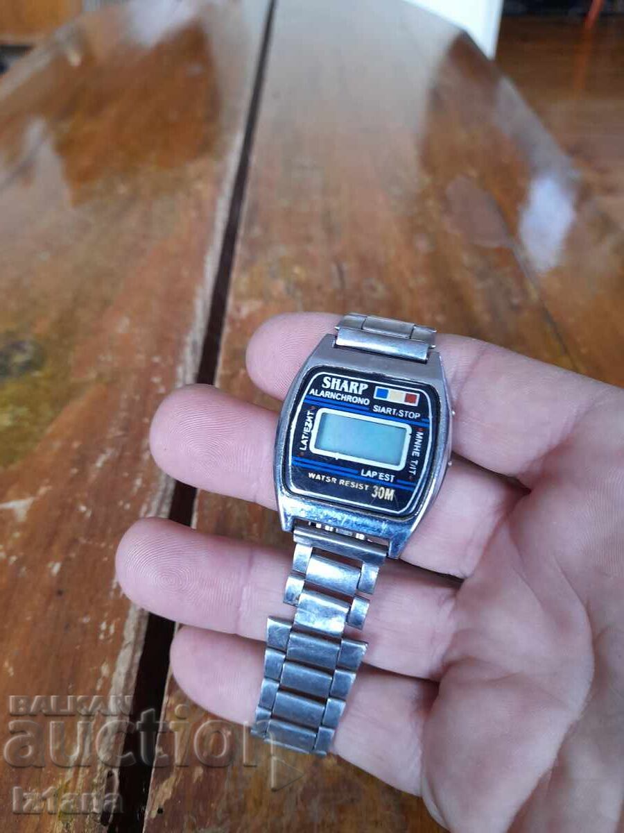 Old Sharp electronic watch with price 27.00 BGN | € 13.80