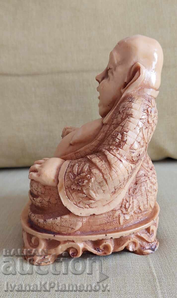 Delivery of Buddha figurine for connoisseurs