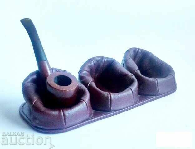 Auction  Old leather pipe stands
