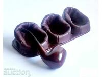 Old leather pipe stands