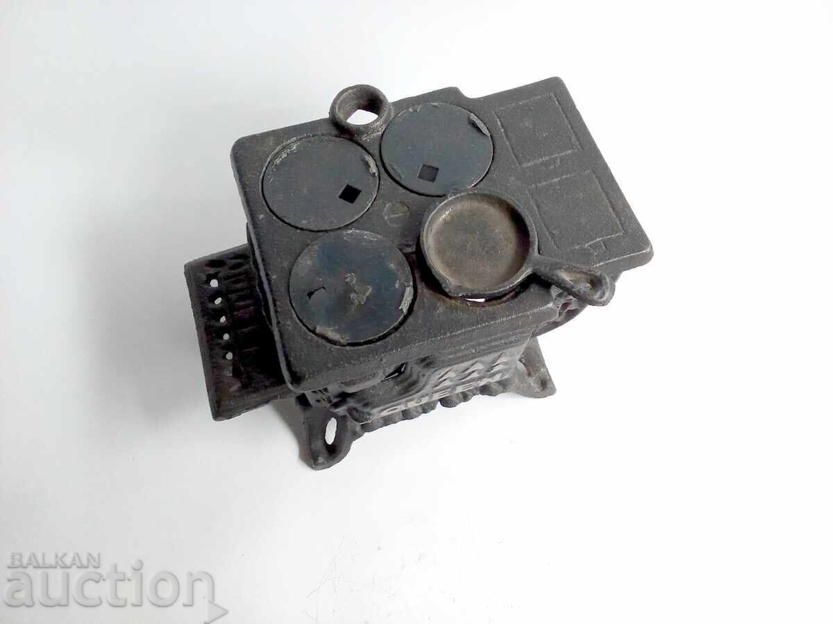Miniature Cast Iron Wood Stove Vintage Queen from the 1960s with price 175.00 BGN | € 89.48 Miniature Cast Iron Wood Stove Vintage Queen from the 1960s with price 175.00 BGN | € 89.48