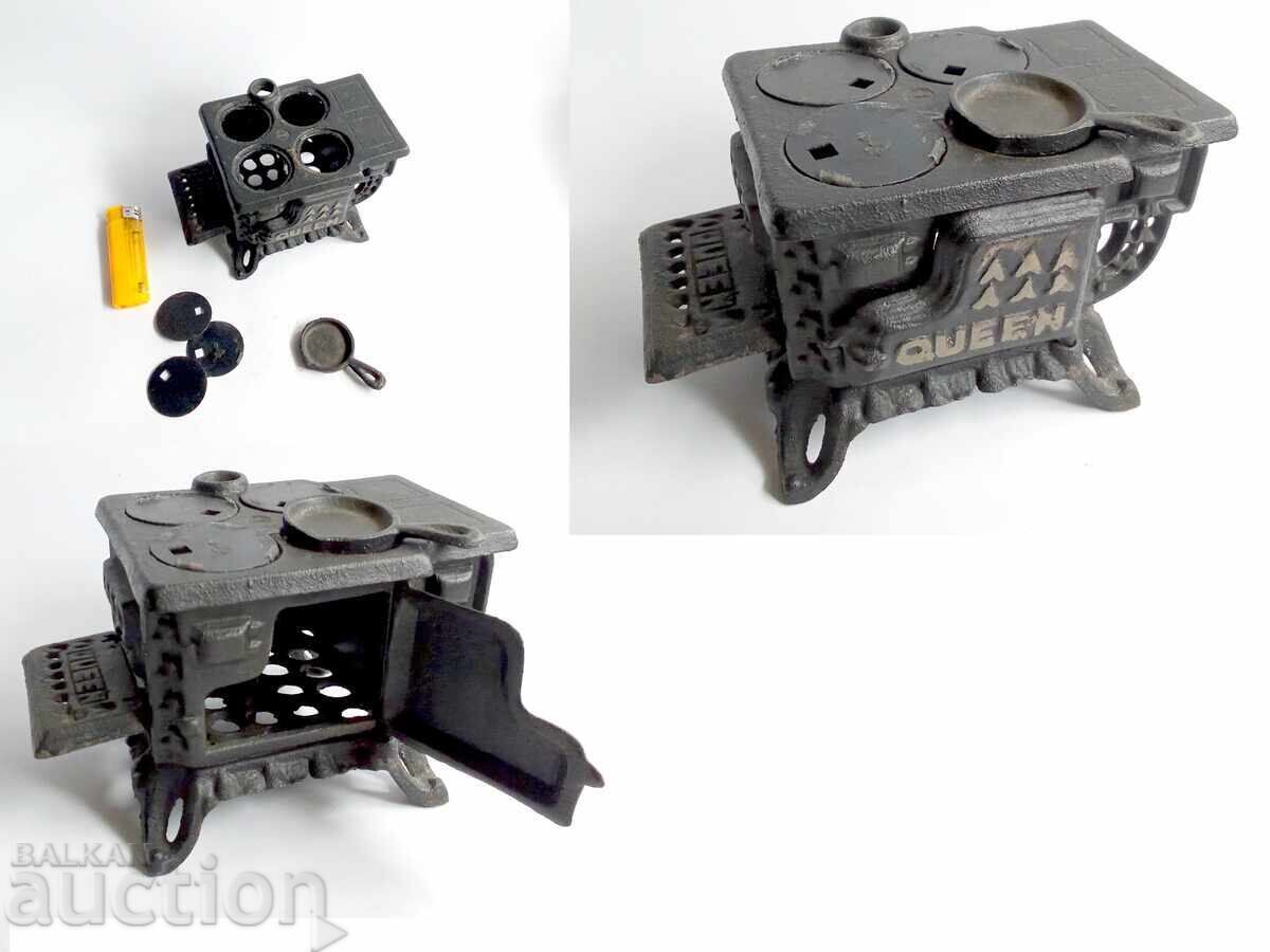 Delivery of Miniature Cast Iron Wood Stove Vintage Queen from the 1960s Delivery of Miniature Cast Iron Wood Stove Vintage Queen from the 1960s