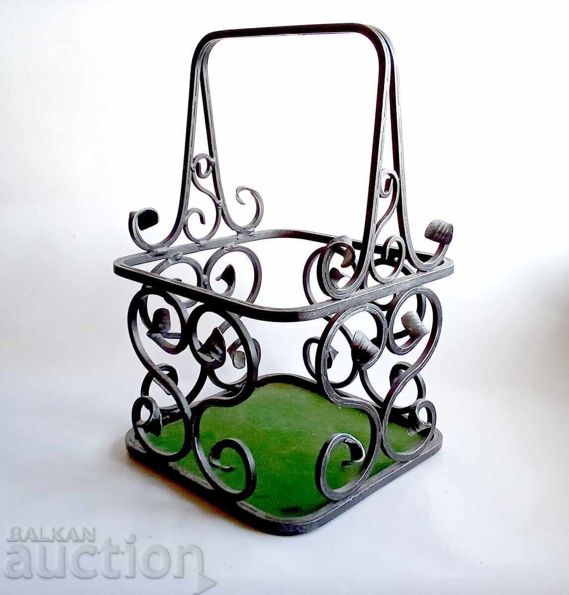 Delivery of Old wrought iron alcohol bottle basket