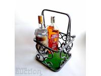 Παλιό καλάθι για μπουκάλια αλκοόλ από σφυρήλατο σίδερο