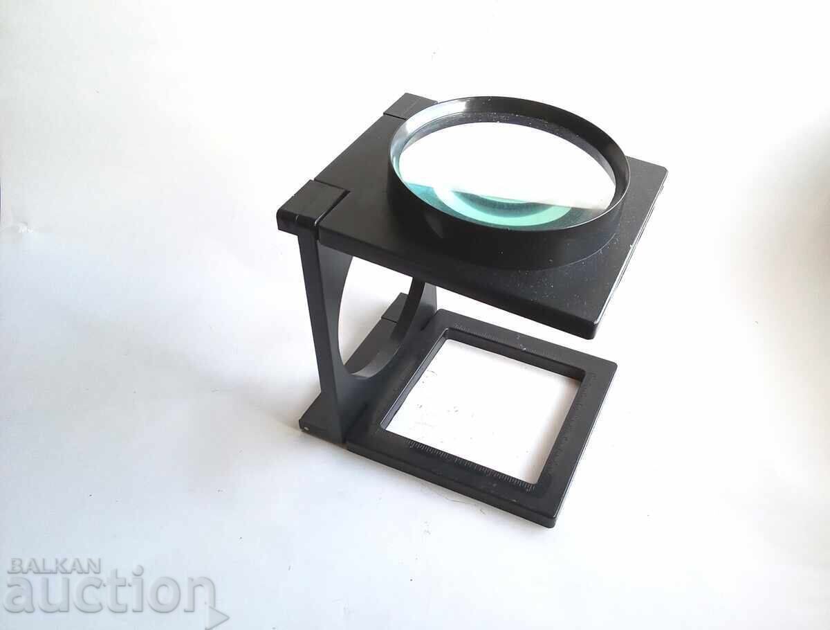 Auction  Magnifying glass for watchmakers and others