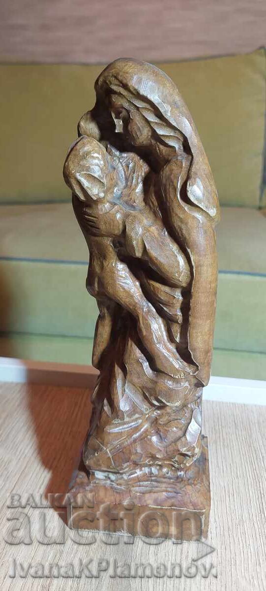 Sculptură în lemn masiv pentru cunoscători