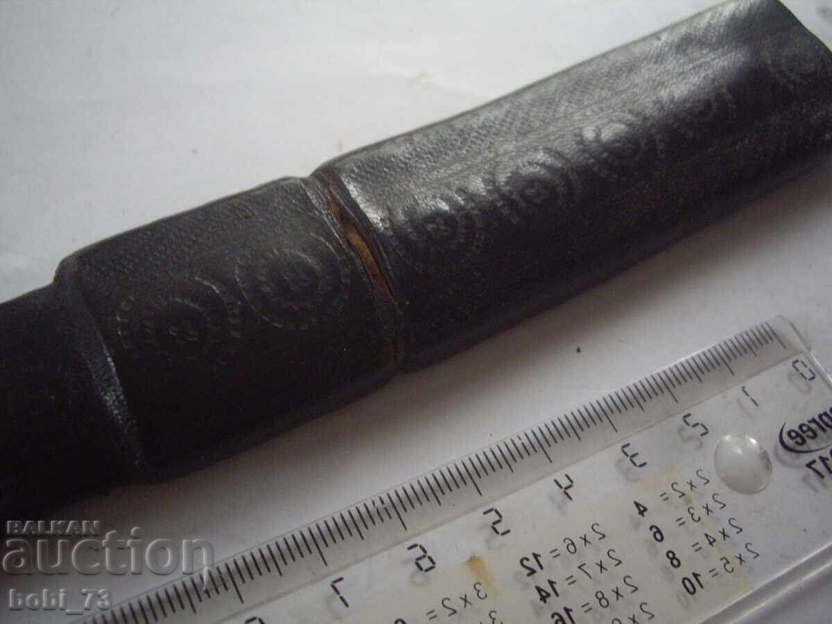 Auction  Old knife with a leather sheath and handle