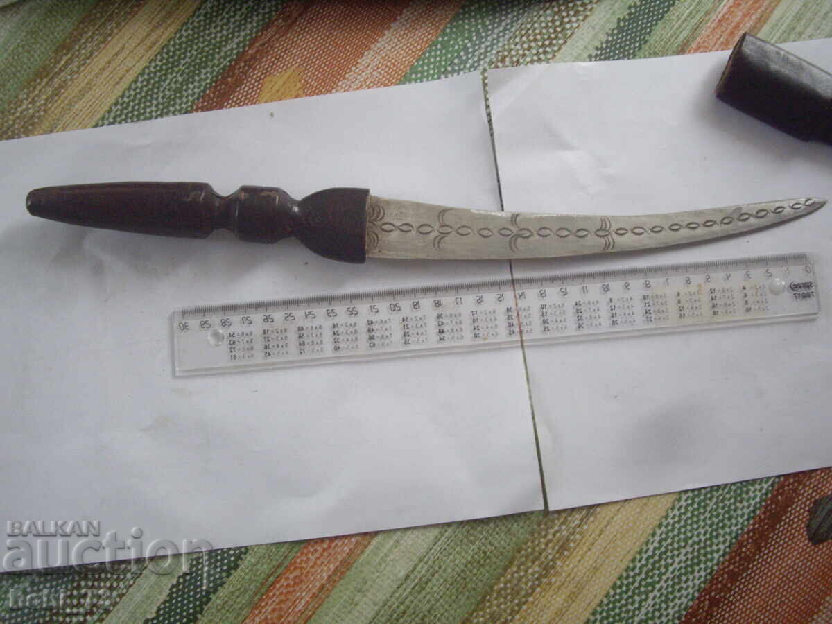 Delivery of Old knife with a leather sheath and handle