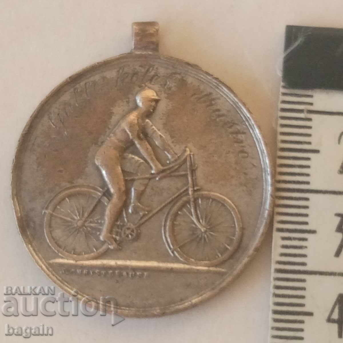 Παράδοση Ένα μοναδικό μετάλλιο ποδηλασίας.