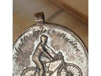 Ένα μοναδικό μετάλλιο ποδηλασίας.