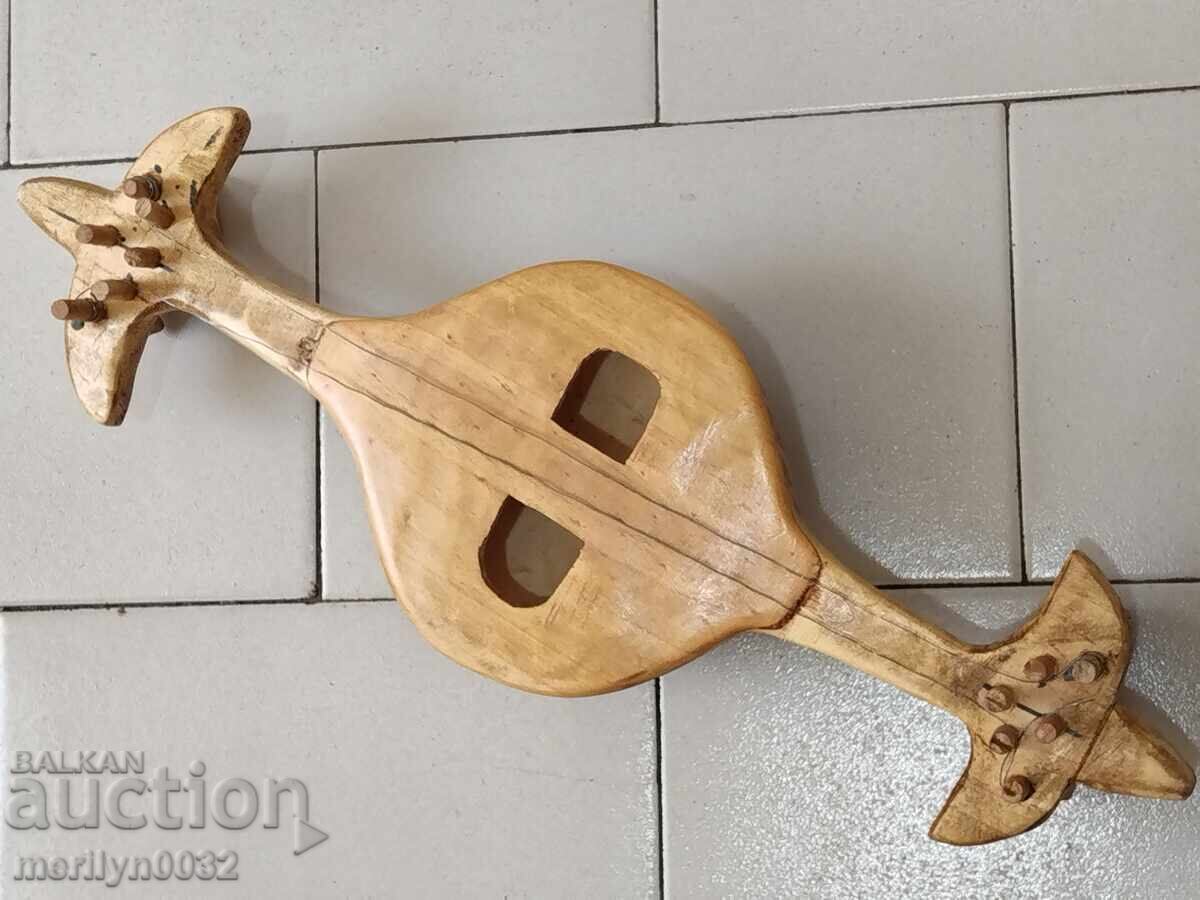 Old bear-making kemane gadulka folk musical instrument