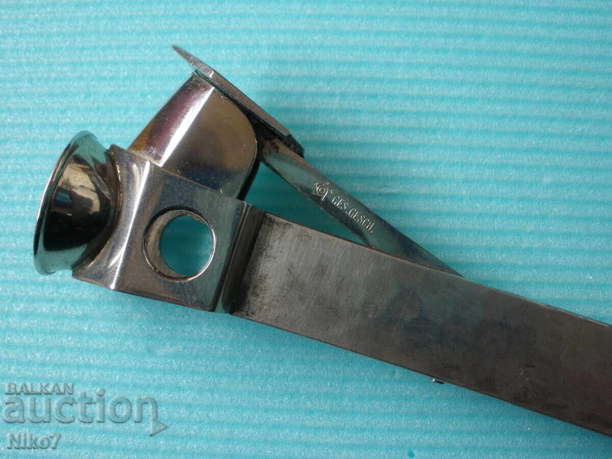 Licitație Vechi, tăietor german (cuțit) pentru trabucuri cu mânere de argint Licitație Vechi, tăietor german (cuțit) pentru trabucuri cu mânere de argint