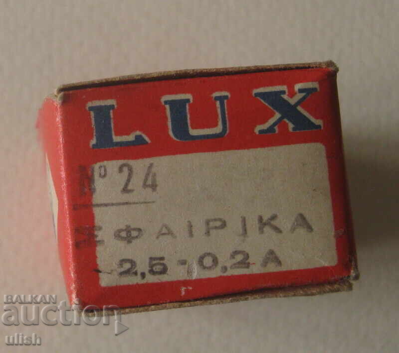 Auction  Old Lux light bulbs for flashlight box