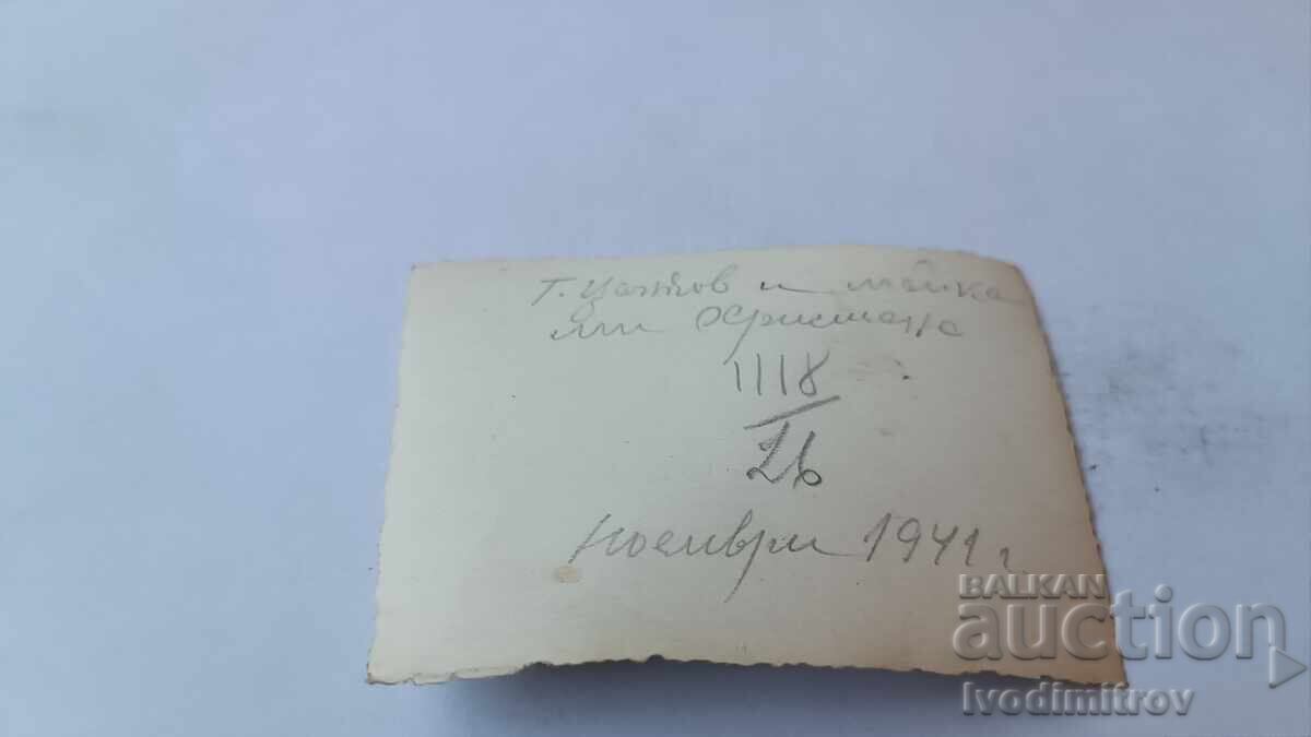 Photo Sofia Man and woman on the street through a Barber shop 1941 with price 2.45 BGN | € 1.25