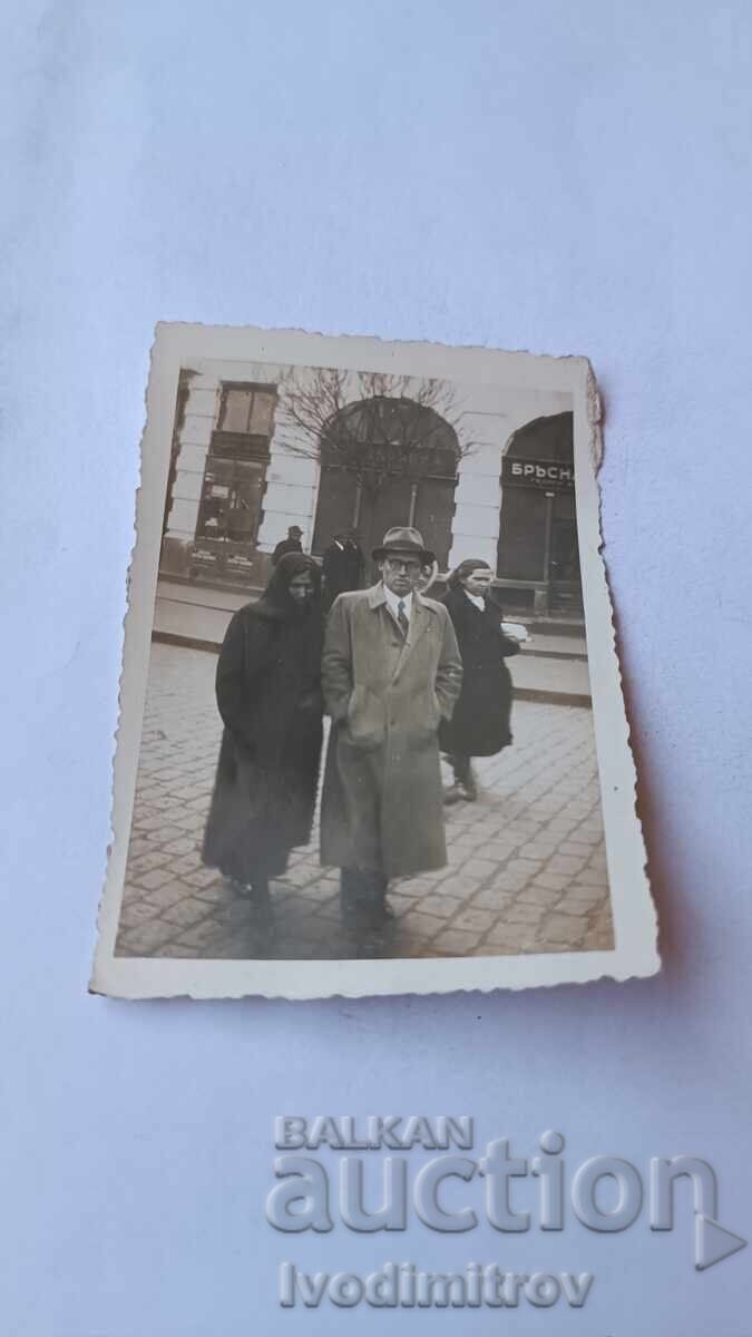 Photo Sofia Man and woman on the street through a Barber shop 1941