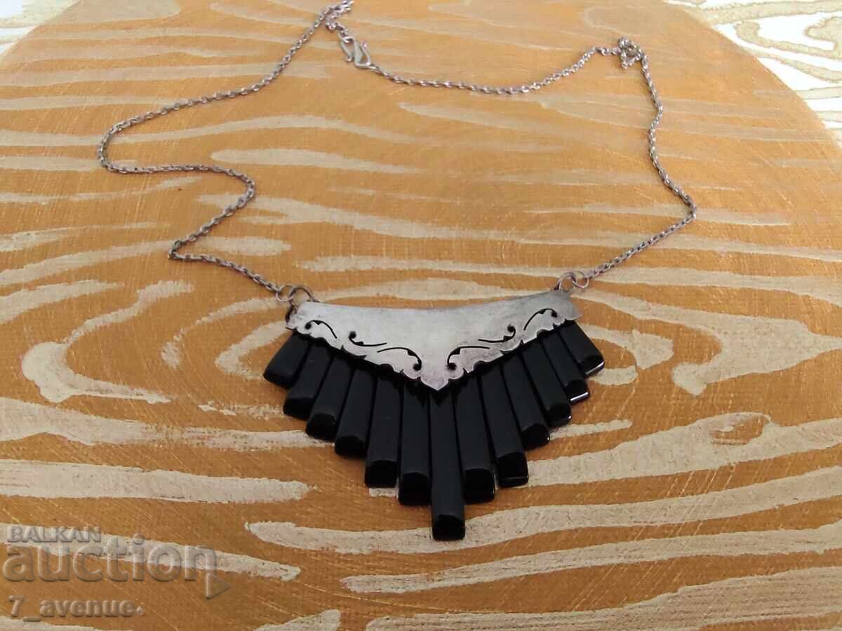 Ασημένιο Κολιέ, χειροποίητο ασήμι και Όνυχας 16.04.2025 με τιμή 169.00 BGN | € 86.41 Ασημένιο Κολιέ, χειροποίητο ασήμι και Όνυχας 16.04.2025 με τιμή 169.00 BGN | € 86.41