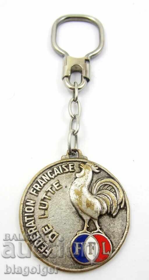 Френска  федерация по борба-Ретро Ключодържател-Петли с цена 9.99 лв. | € 5.11